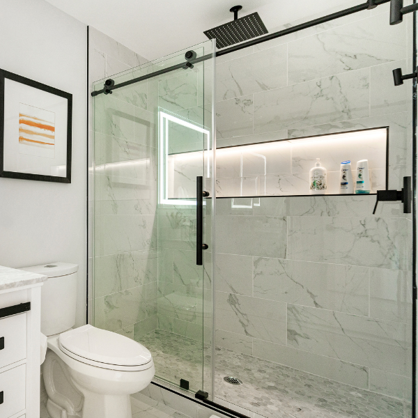 Sliding bypass shower door in bathroom