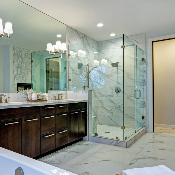 Frameless shower door with clips, return panel in bathroom